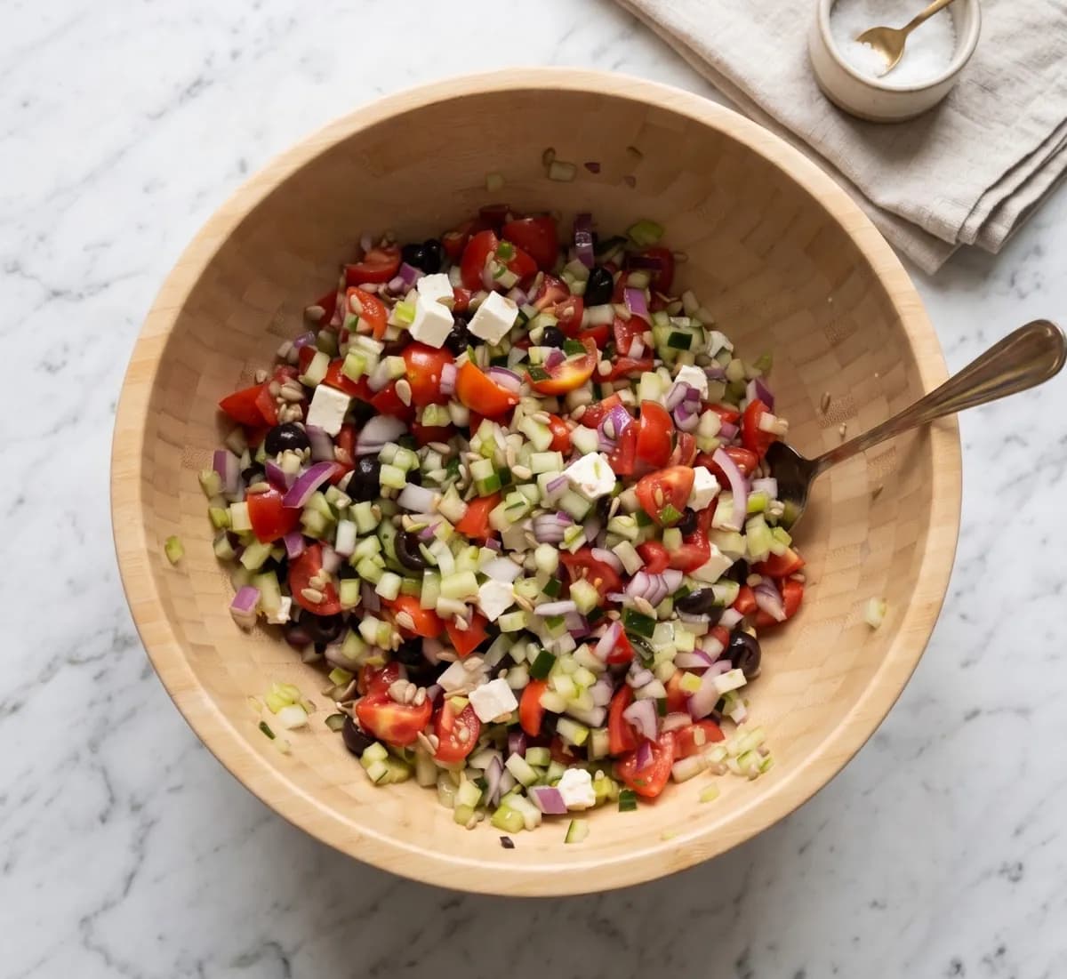 Bowl of chopped tomato, cucumber and feta salad