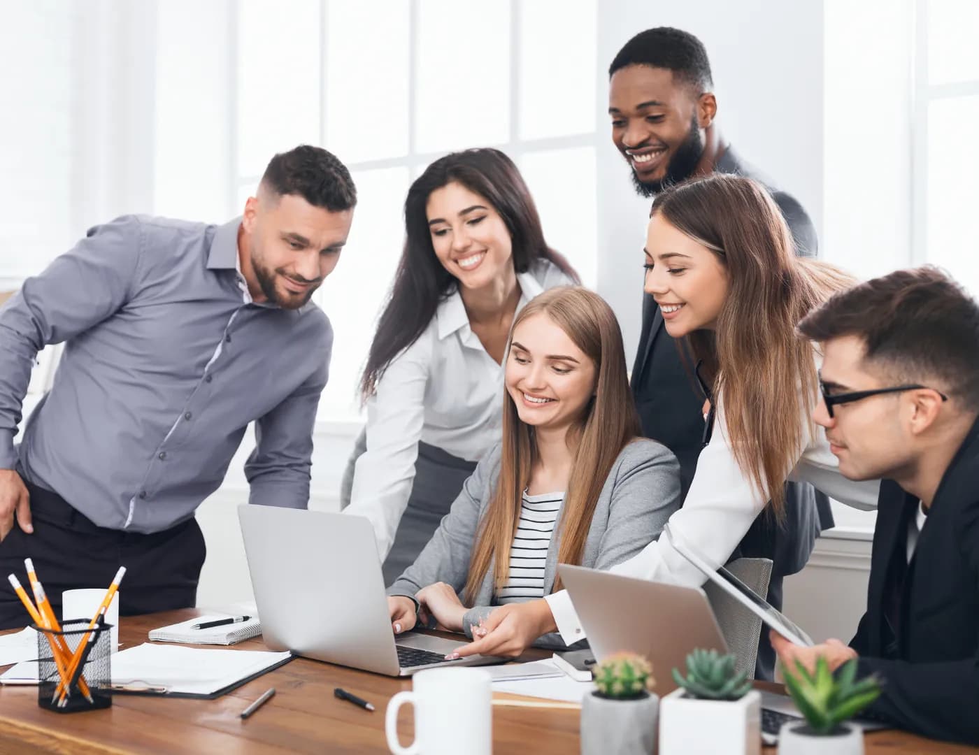 Colleagues collaborating in a bright, modern office