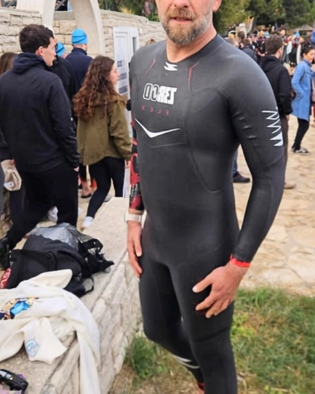 Male client after — completed a Half Ironman following nine months of nutrition coaching